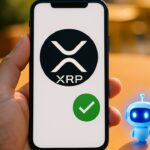 Smartphone met XRP-logo en een betaalbevestiging, symbool voor automatische AI-betalingen